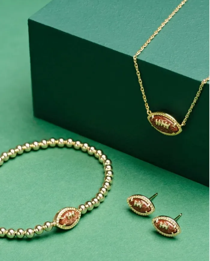 Earrings KENDRA SCOTT KENDRA SCOTT Football Gold Stud Earrings in Orange Goldstone 9608868043