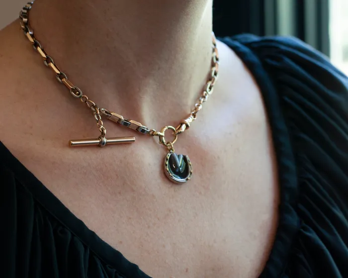 Necklaces Bell Bird Antiques Early 20th Century Platinum and Gold Horseshoe Charm Necklace