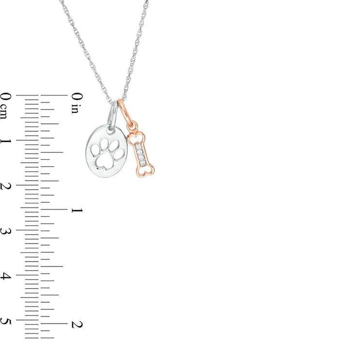 Goldia Natural Diamond Accent Dog Bone and Paw Print Disc Pendant in Sterling Silver and 10K Rose Gold Necklaces Goldia Natural Diamond Accent Dog Bone and Paw Print Disc Pendant in Sterling Silver and 10K Rose Gold Necklaces